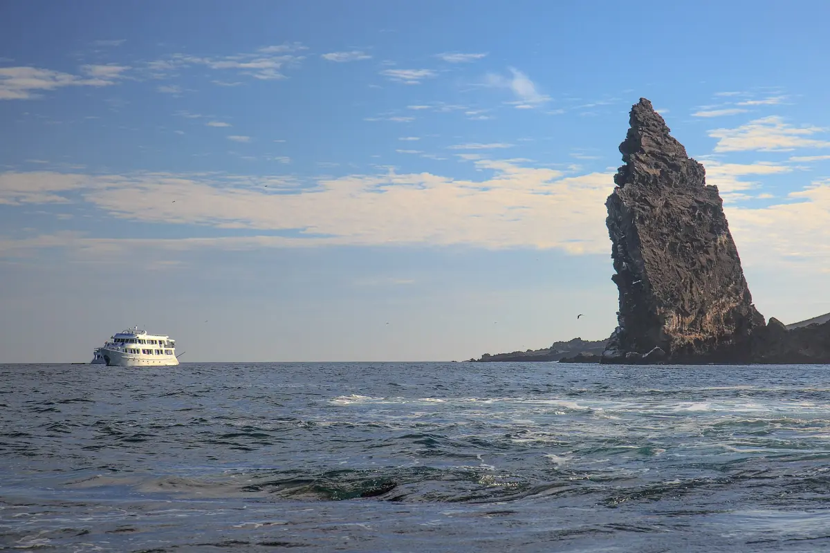 A small cruise ship near Pinnacle Rock