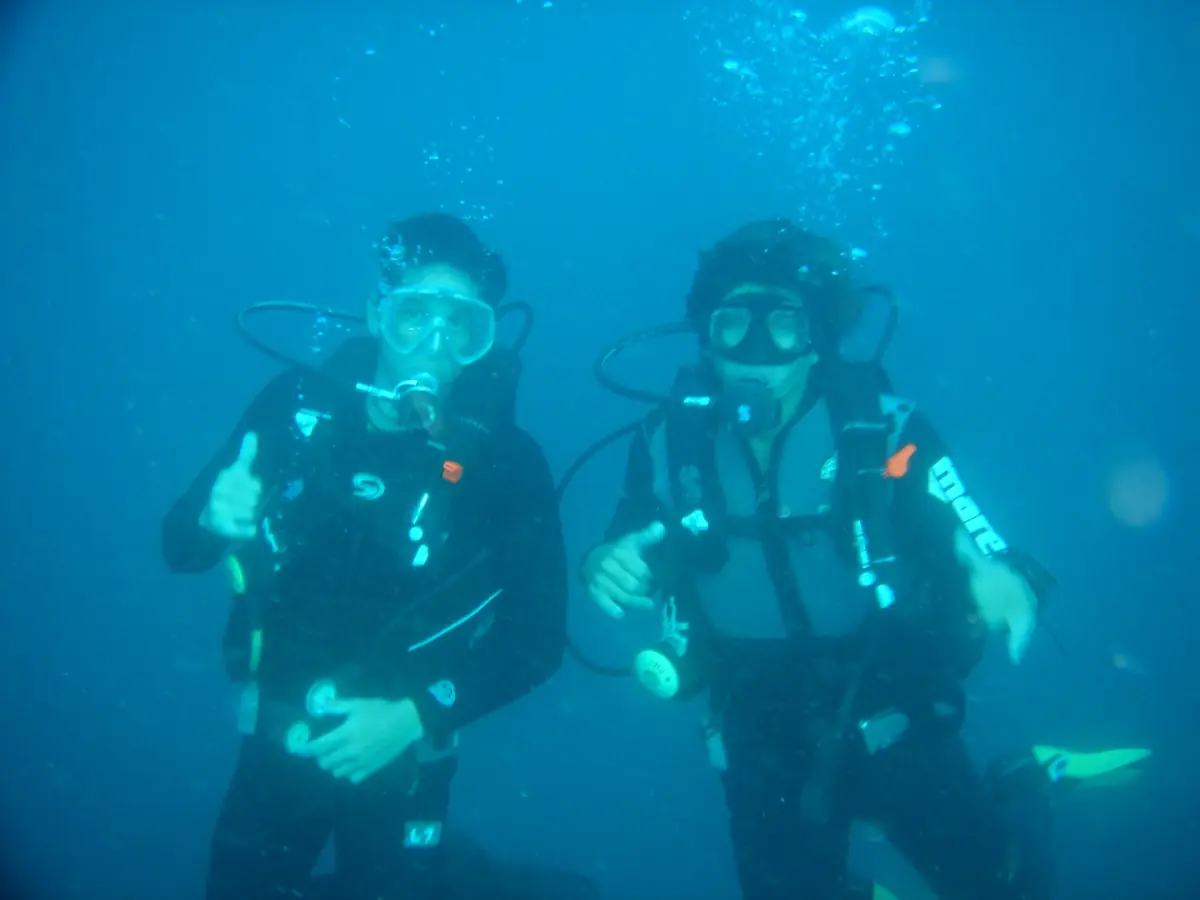 Two scuba divers in Galápagos waters